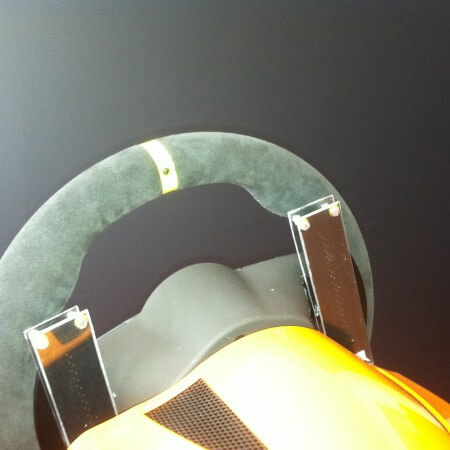 Slider mounted at the back of the steering wheel