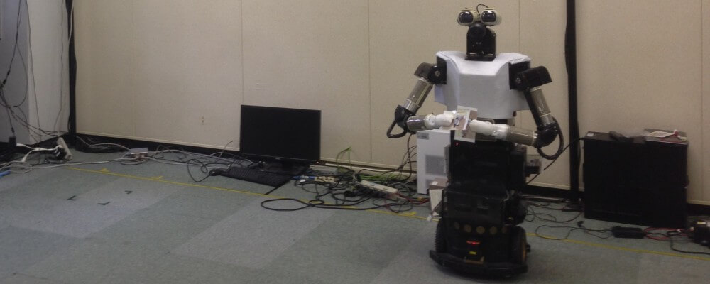 Flyer distribution robot searching for humans. The picture was taken at ATR, Advanced Telecommunications Research Institute, Japan
